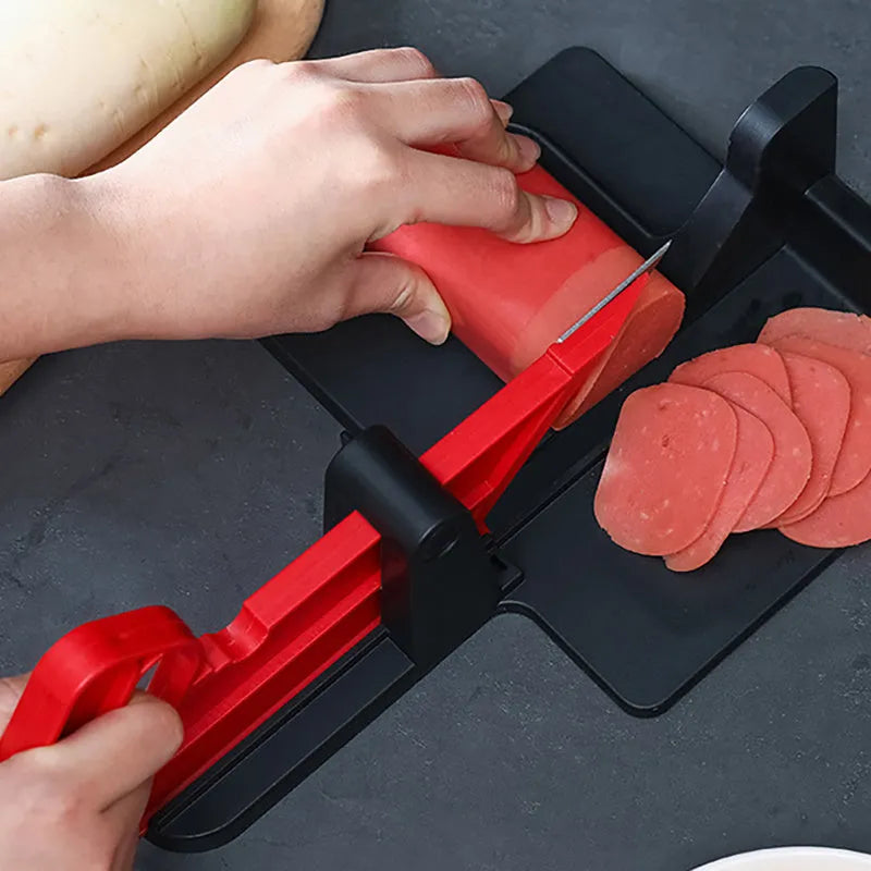 Green vegetable cutter with stainless steel blades for slicing carrots and potatoes