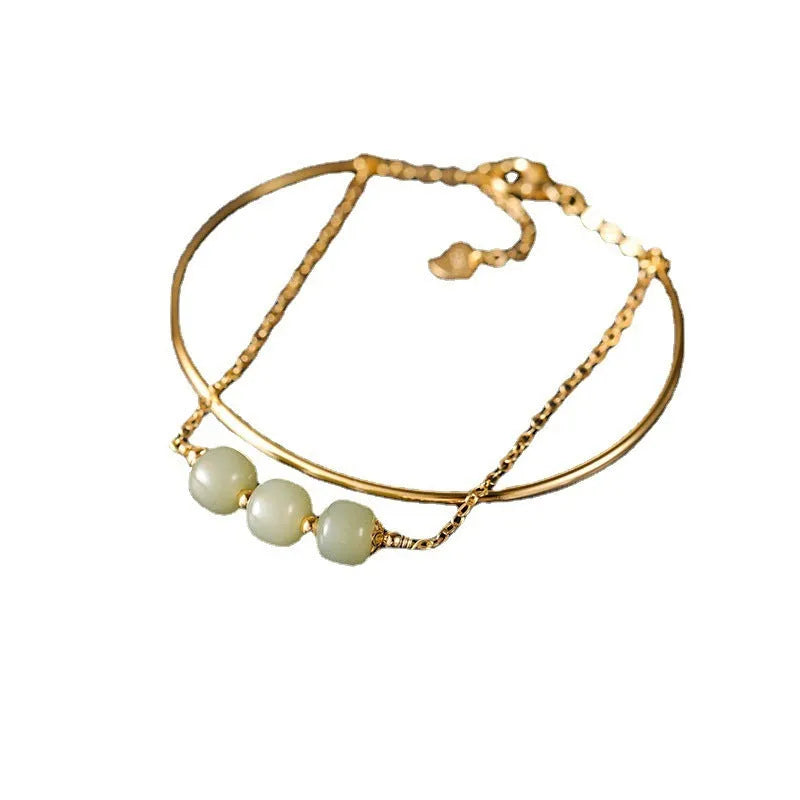 Hetian jade bracelet with gold-inlay treatment in single, double, or three-bead versions for women