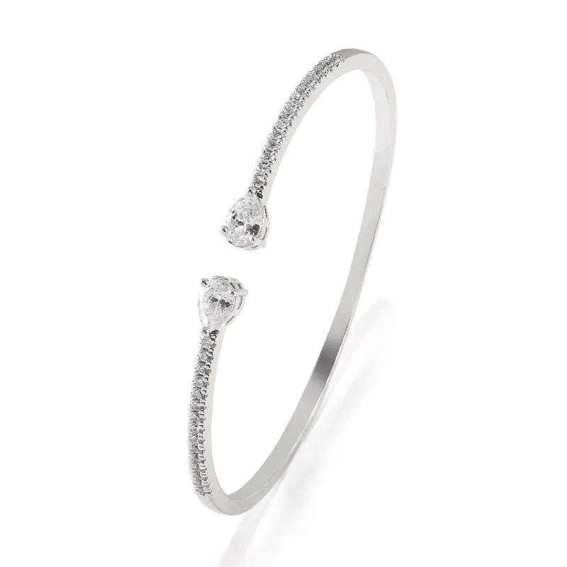 Multi-zircon personalised bracelet with inlaid zircon treatment on copper in white or blue