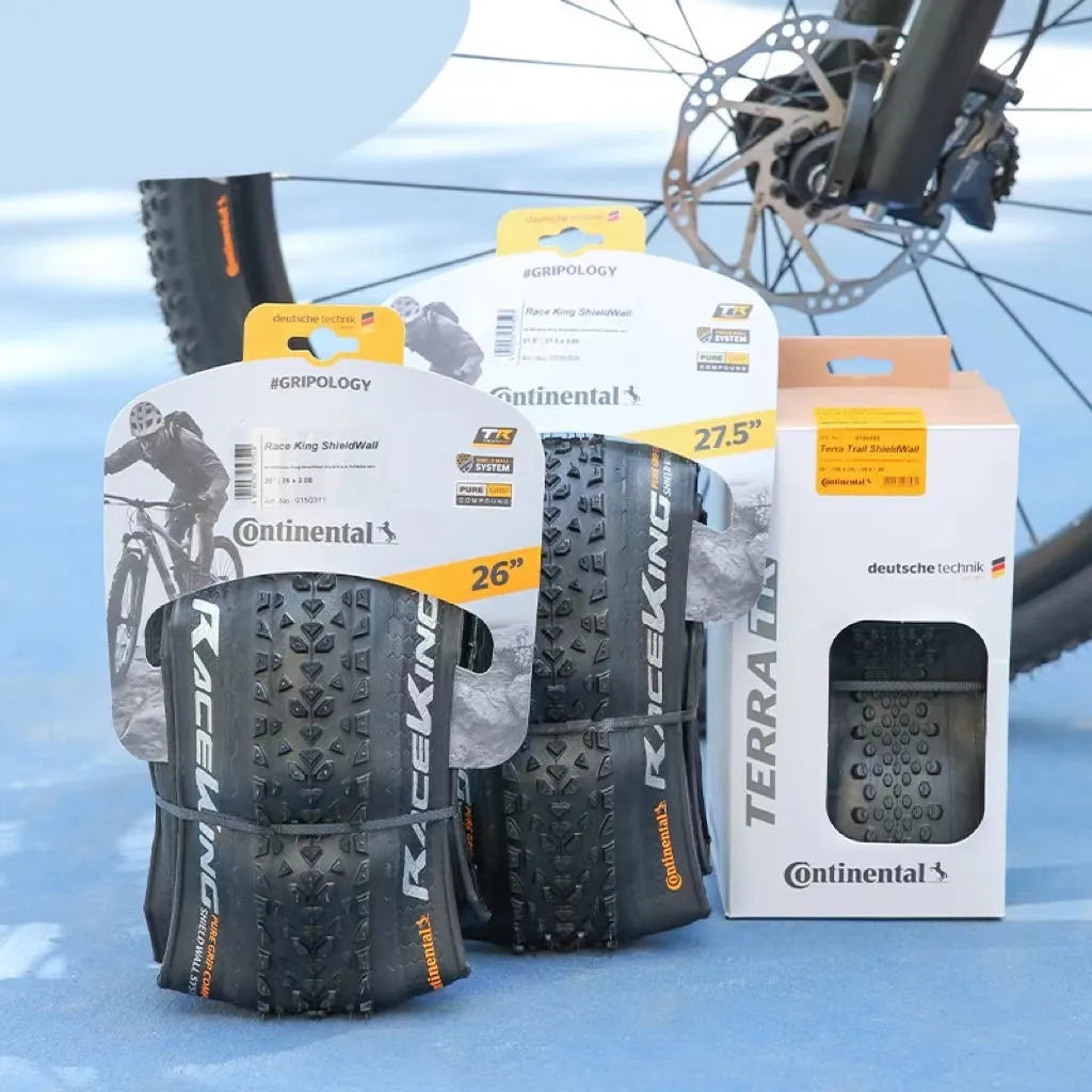 Mountain bike folding outer tyre with 180 TPI casing, shown in yellow or white, suitable for off-road cycling