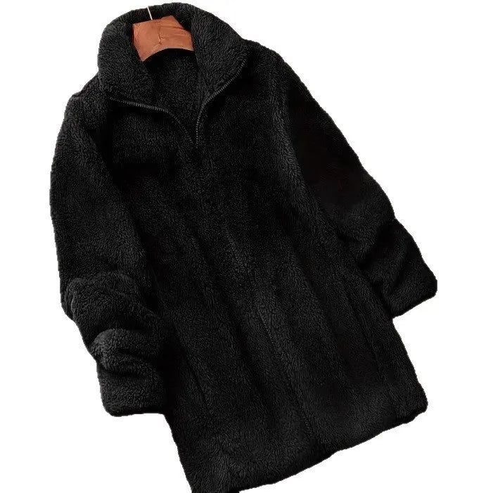 Double-sided fleece jacket in black with a velvet exterior and fleece lining.