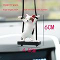 Cartoon-style resin cat pendant for car interior decoration in various colours with adjustable rope.
