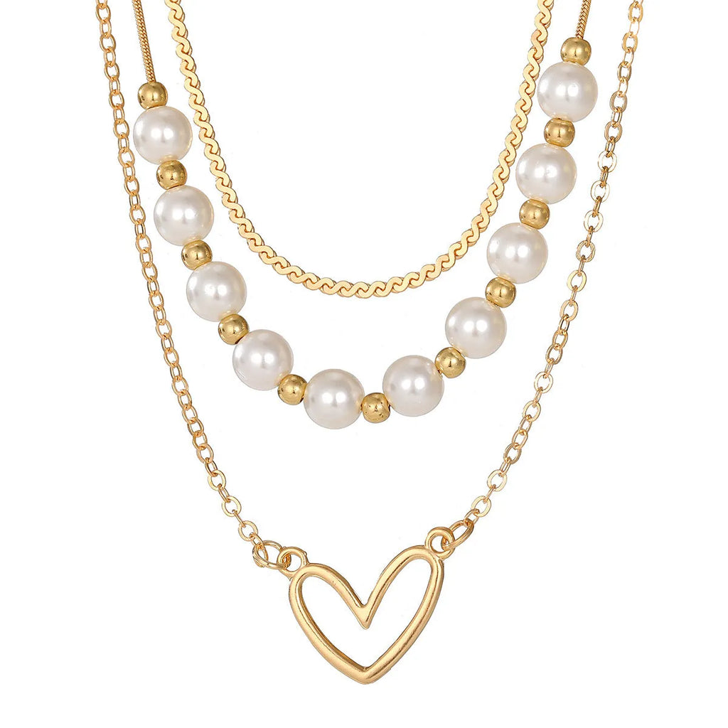 Vintage gold heart necklace on pearl chain with adjustable 41-50cm length