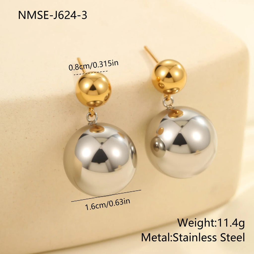 A pair of women's stud earrings with colour-blocked round geometric beads on stainless steel posts.