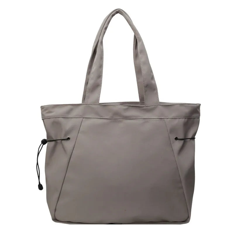 Soft foldable Oxford cloth tote bag in street style, shown in a choice of five colours.