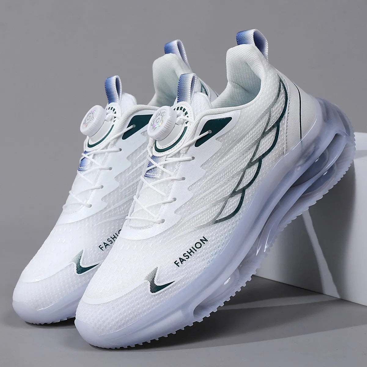 White low-top mesh trainers with rotating button lace-up and rubber soles for sports and casual use