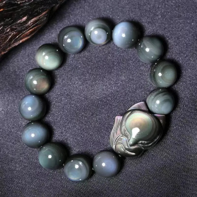 Obsidian fox carved couple bracelet showing animal zodiac design in cartoon style