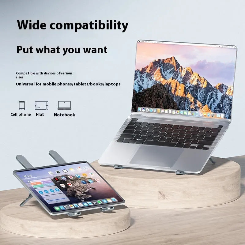 Silver aluminium laptop stand with twin cooling fans in folded position beside laptop