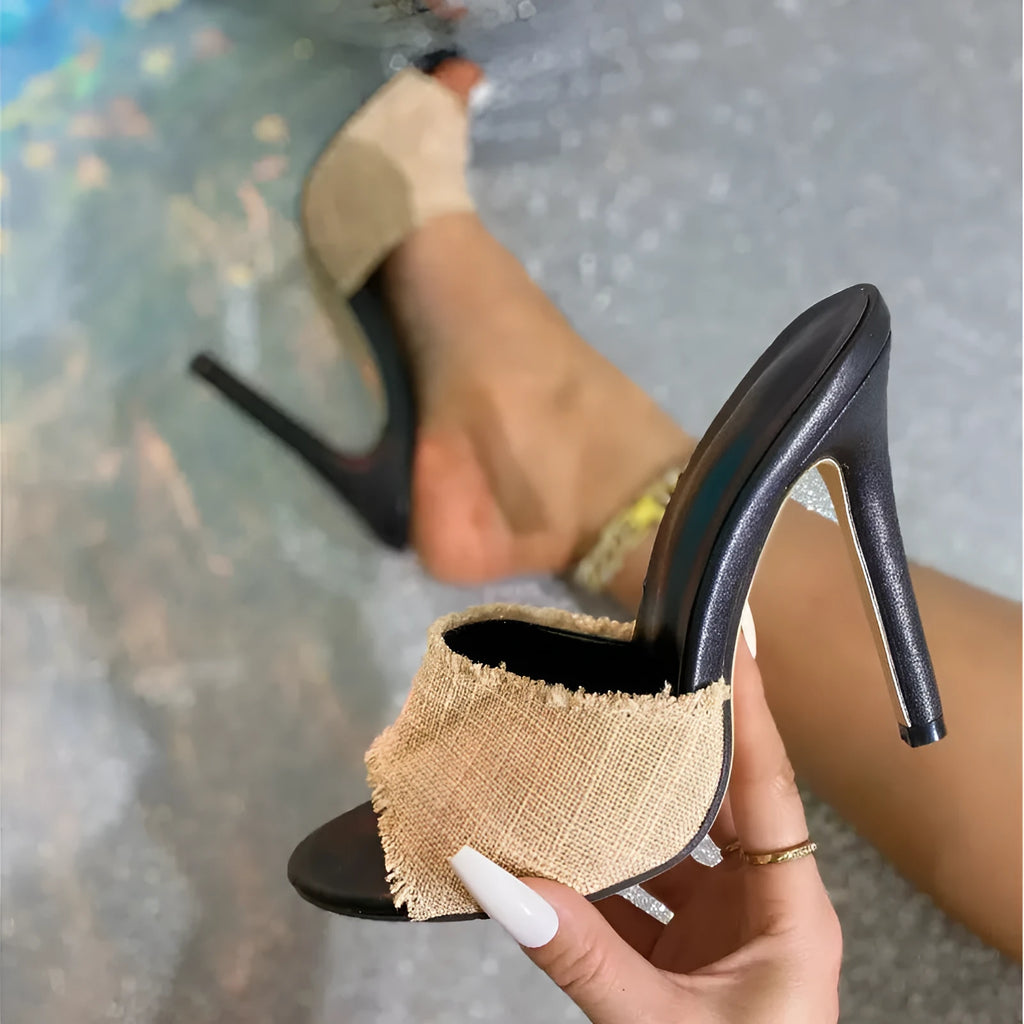 Apricot coloured women's stiletto sandals with toe separator, sheepskin and fur upper.