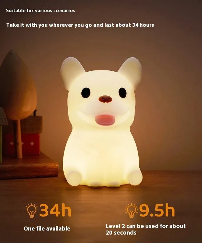 Silicone cartoon bull night light with USB port for charging and dimming controls.