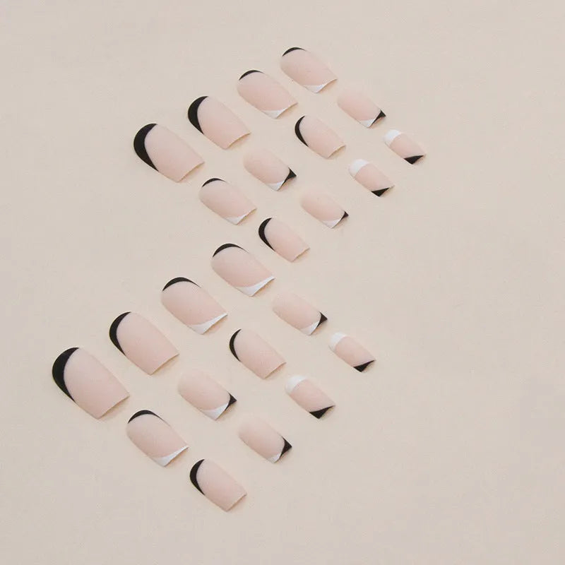 Black and white frosted manicure set with plastic wearable armour for DIY nail art
