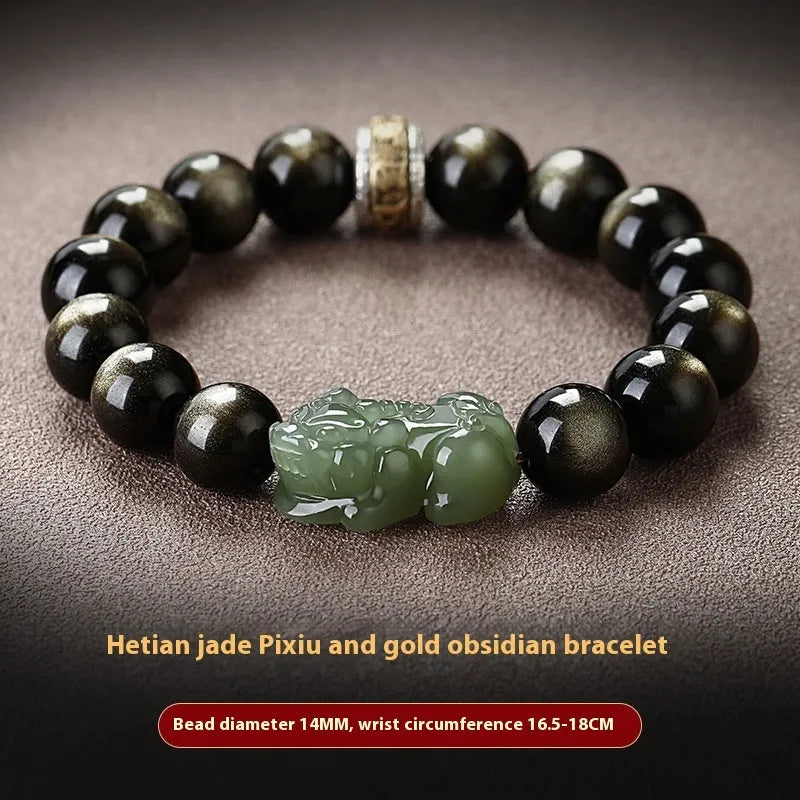 Natural rainbow eye obsidian and stone bracelet in gold or jade colours on a white background.