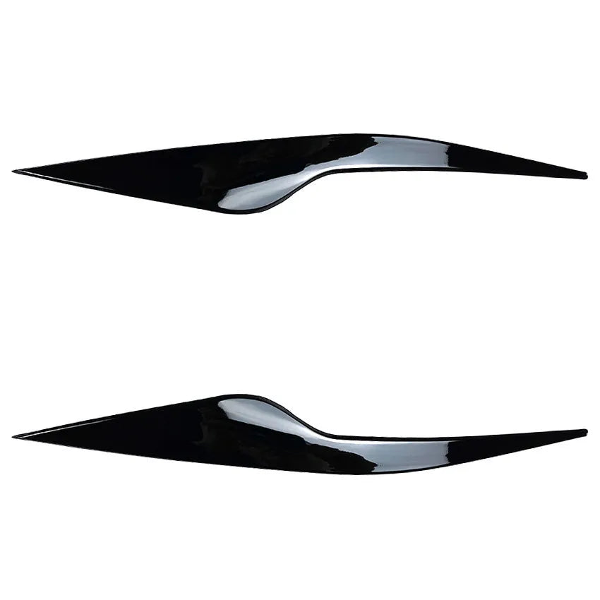 Ford Focus headlight eyebrow stickers in carbon fibre pattern and piano black finishes