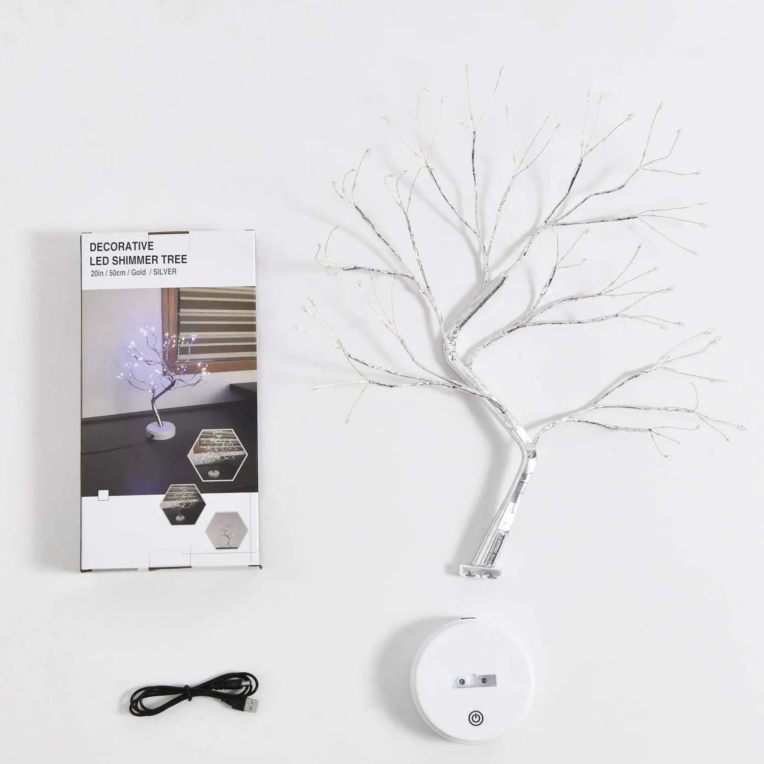 White LED tree-shaped lamp with bendable copper wire branches, 50cm tall, on a table.