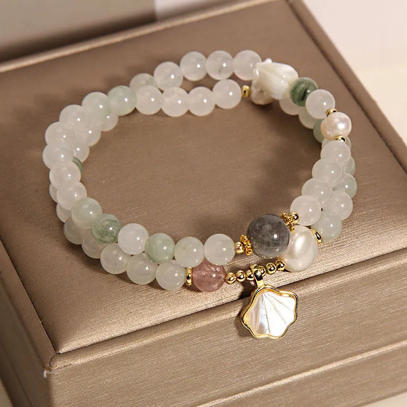 Crystal bracelet with Tianshan jade shell ginkgo leaf pendant and gold-plated gemstone settings