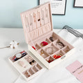 Large red or white PU leather jewellery storage box for necklaces and rings.