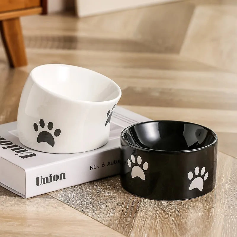 Ceramic cat bowl with high foot design and cat's paw pattern in choice of colours