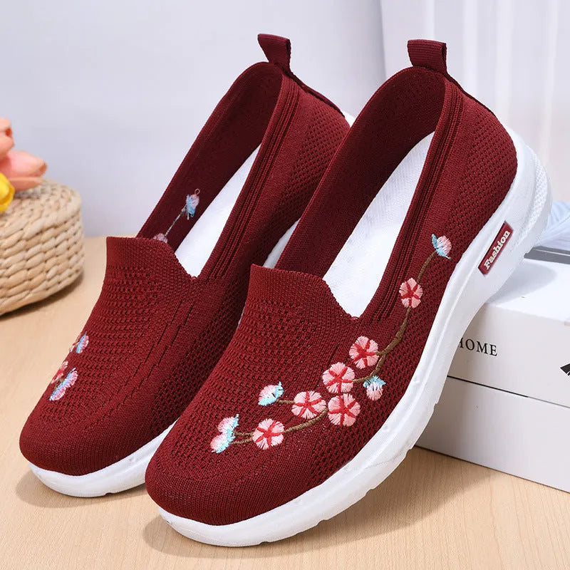 Women's low-heel woven casual pumps with flower embroidery and an anti-slip sole in wine red.