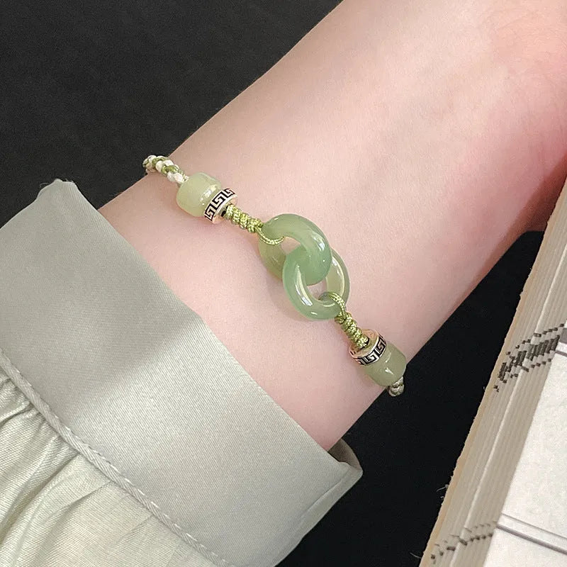 Green jade double ring strap bracelet with peace buckle and animal zodiac design in electroplated copper