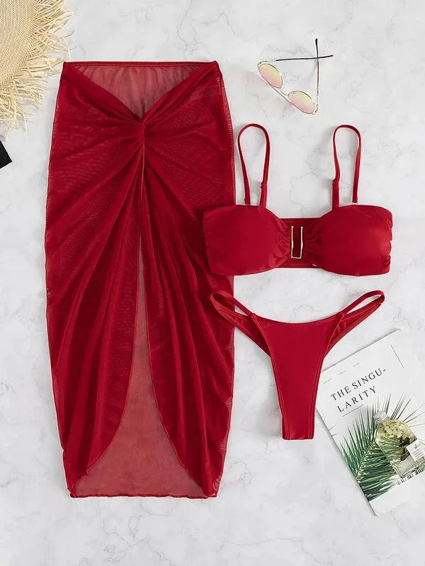 Women's three-piece bikini set with long culottes in French style, showing bra, panties, and skirt in solid colour