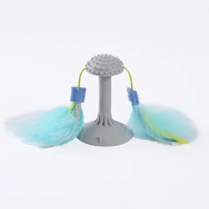 Blue plastic suction cup cat toy wand with double-haired prick head and grinding teeth section