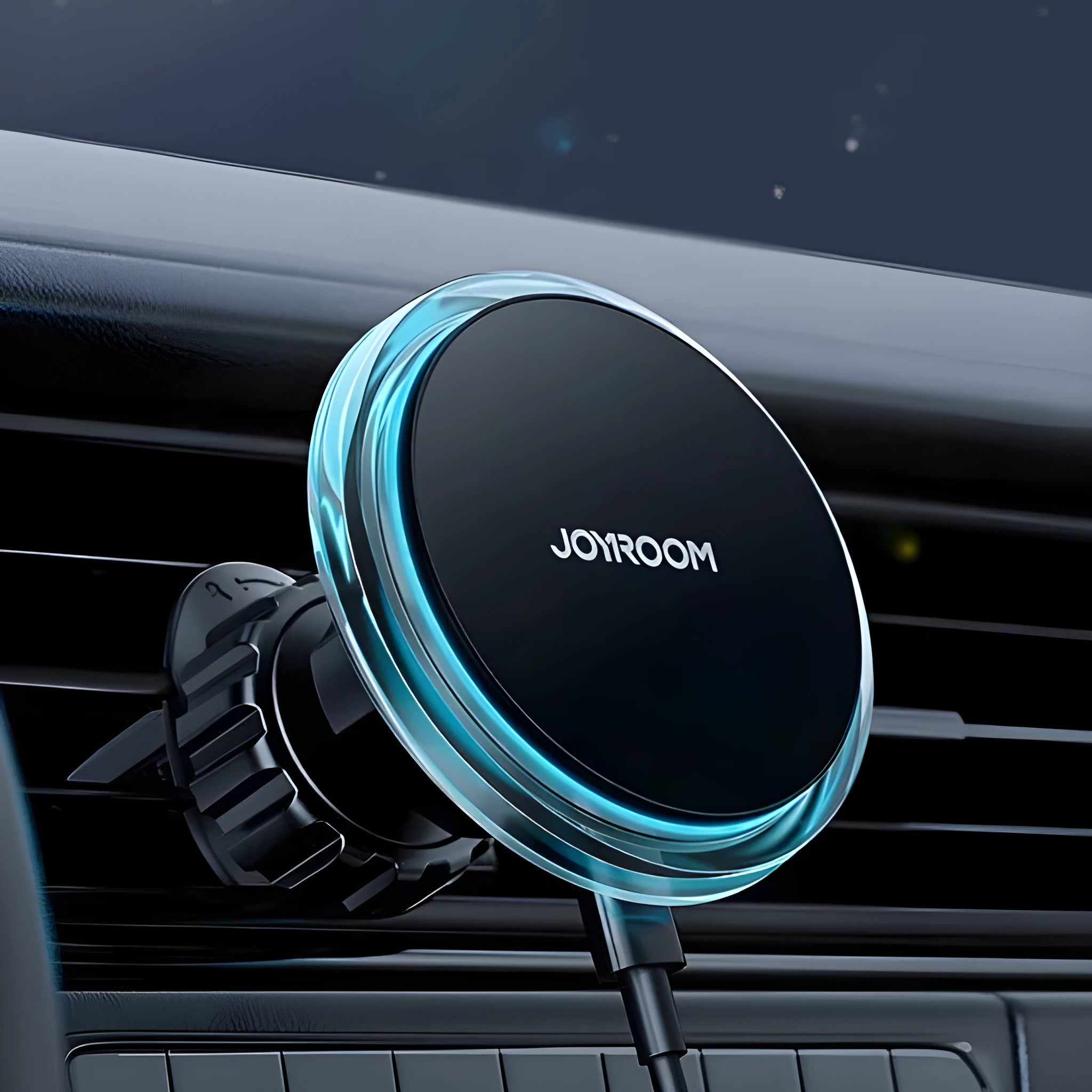 Black magnetic wireless car charger mounted on a car air vent, charging a mobile phone.