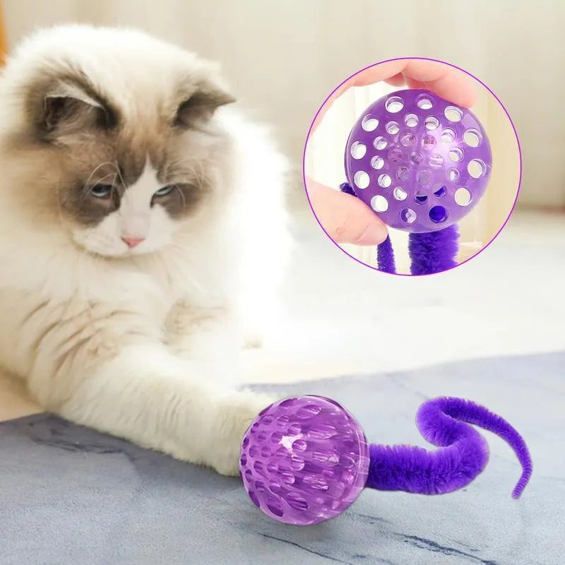 Bouncy TPR ball cat toy with soft plush tail attachment in green colour
