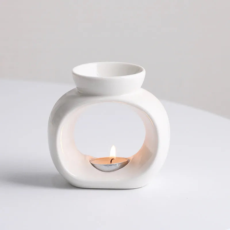 White ceramic aromatherapy stove ornament with Nordic design and anti-dry burning safety feature