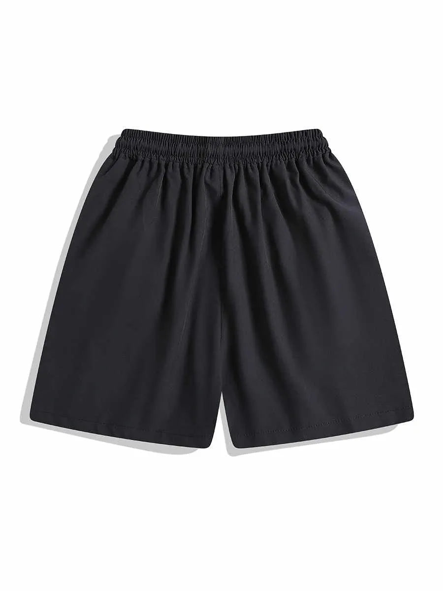 Loose-fit quick-drying sports shorts in black with elastic waistband and above-knee length