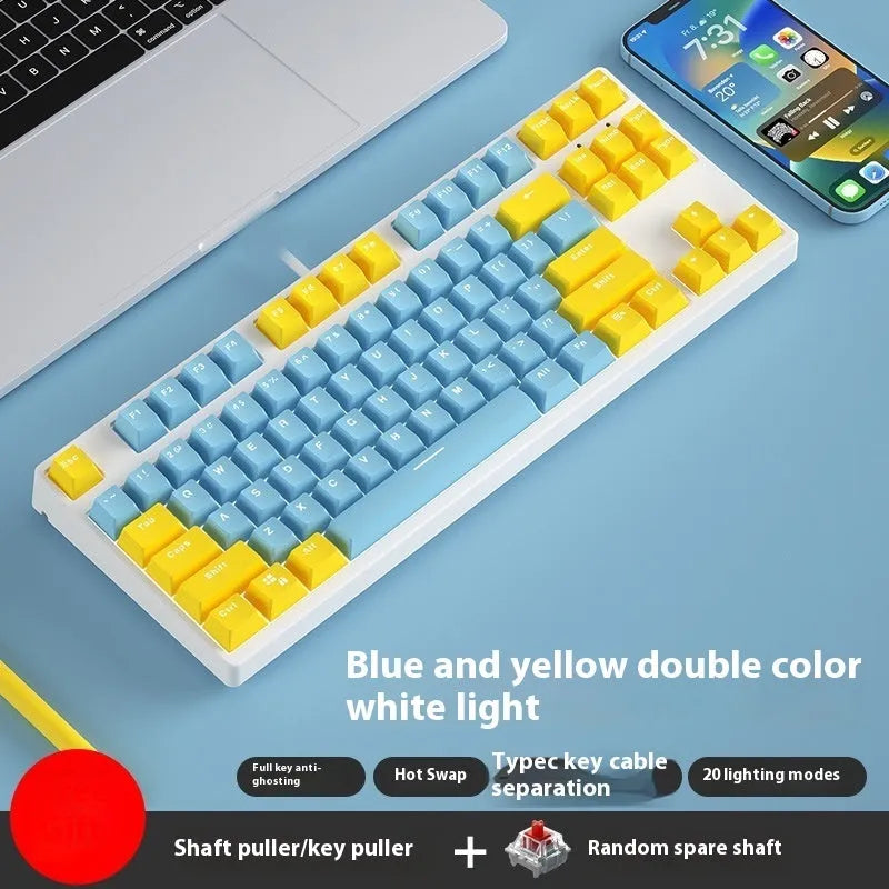 87-key wired mechanical keyboard with two-tone keycaps and metal frame, showing compact design and included tools