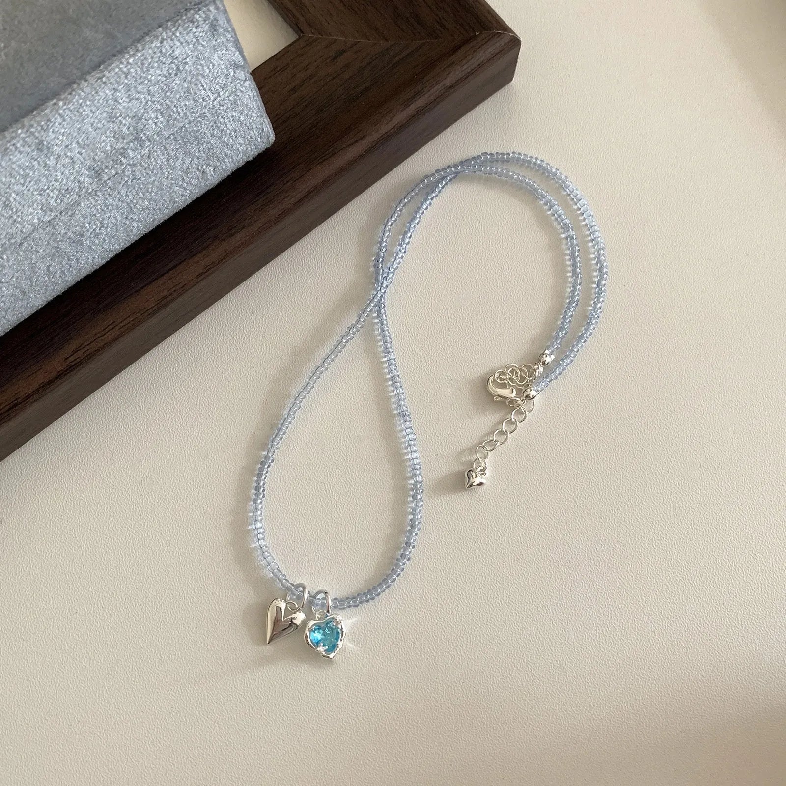 Women's hollow flower necklace with electroplated copper pendant and colourful beaded chain in Korean style