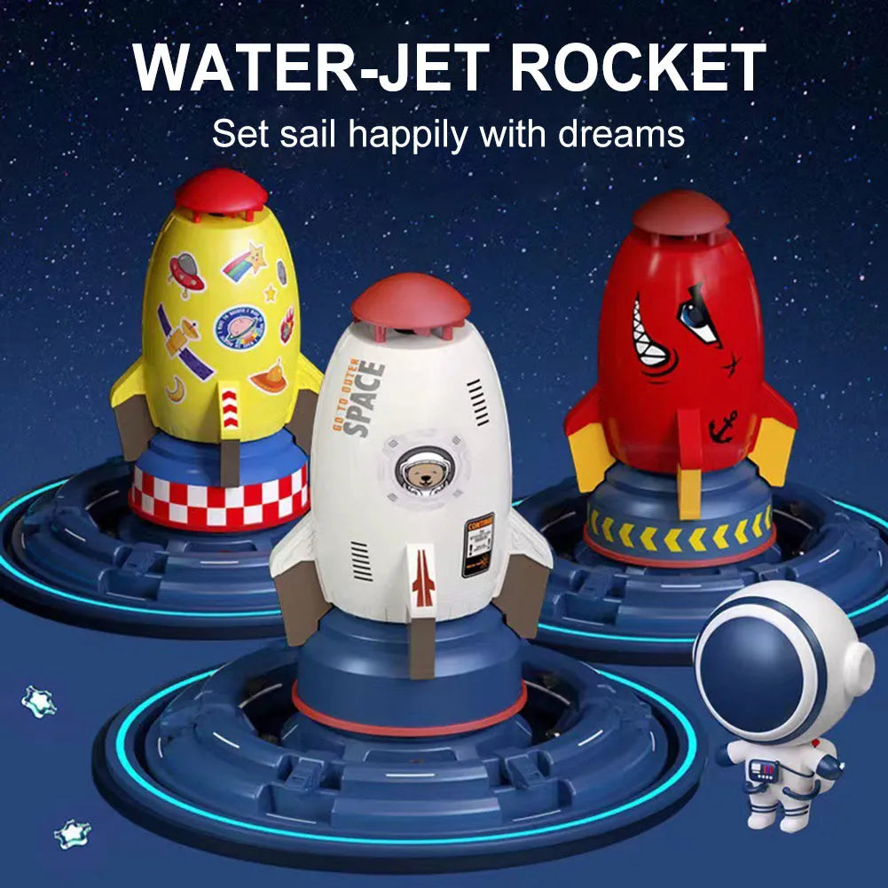 Yellow water pressure rocket launcher toy for kids outdoor garden play on a green lawn.