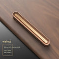 Long strip car aromatherapy ornament in walnut colour mounted on a car air vent