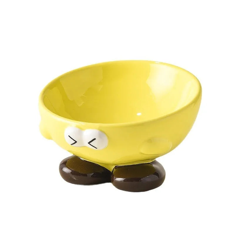 Blue slanted ceramic pet bowl for cats and dogs on a plain background.