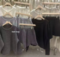 Women's loose-fitting acrylic fibre sweater with knitted wide leg shorts in oatmeal colour