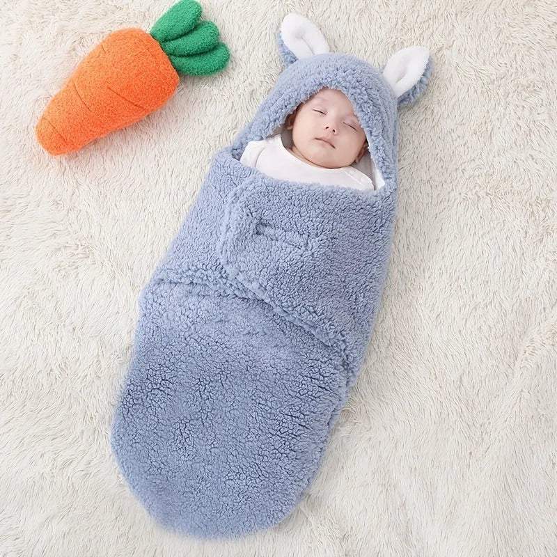 Baby wearing adjustable cotton swaddle sleep sack with velcro closure