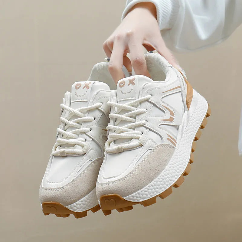 Women's grey casual lace-up shoes with round toe and flat heel on a white background.