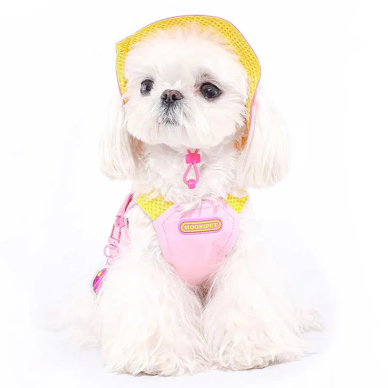 Pink dog traction vest harness for small breed dogs on a white background.