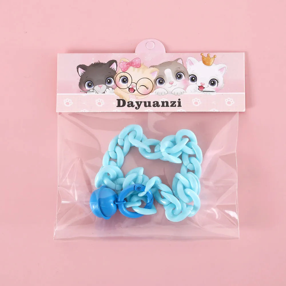 Adjustable pet collar in macaron candy colours with plastic construction and monochrome pattern