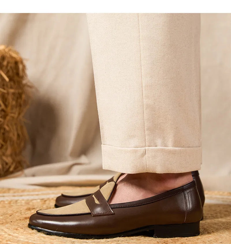 Men's champagne-coloured suede leather loafers with a slip-on design and rubber sole.