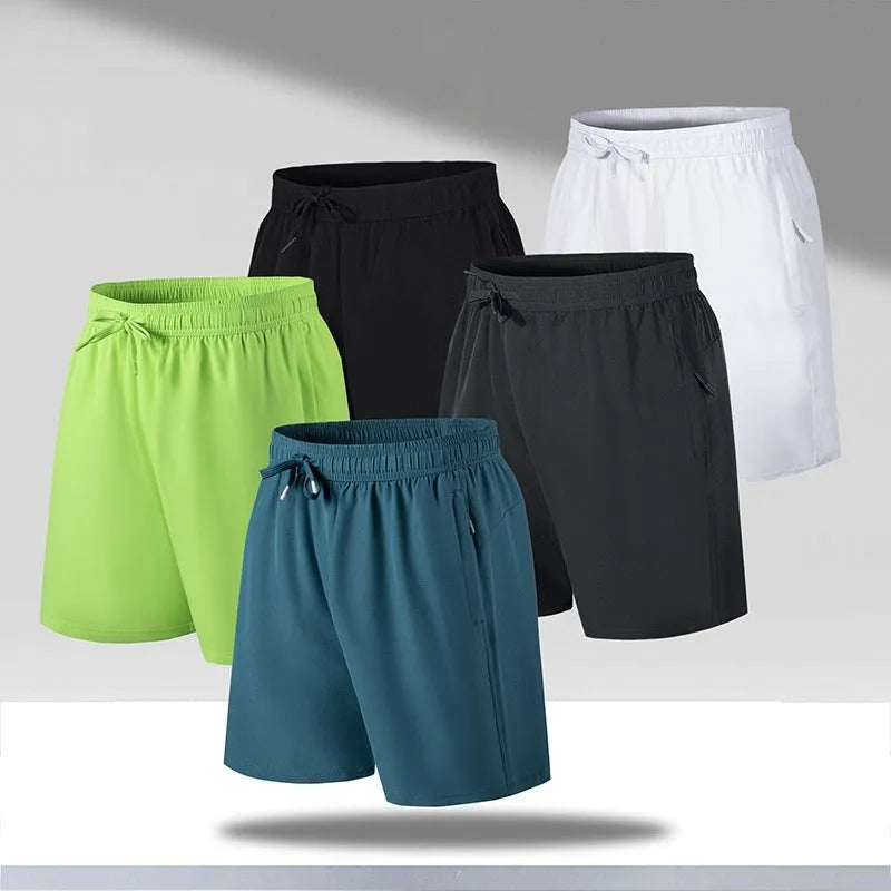 Men's loose fit quick-drying sports shorts in polyester fibre with micro-elastic waistband