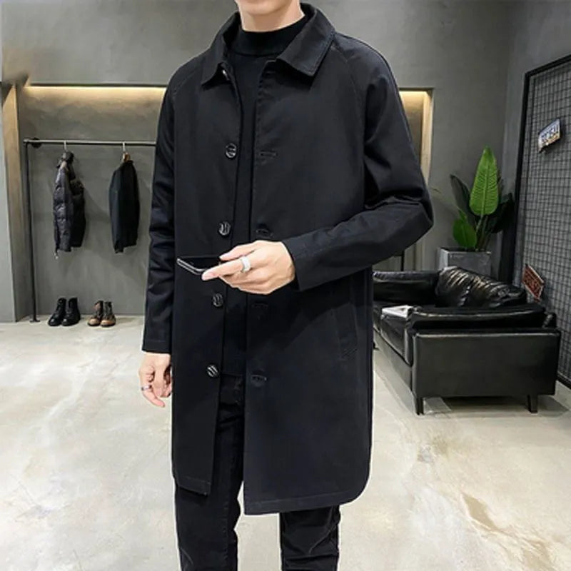 Men's khaki trench coat with loose casual fit and mid-length design