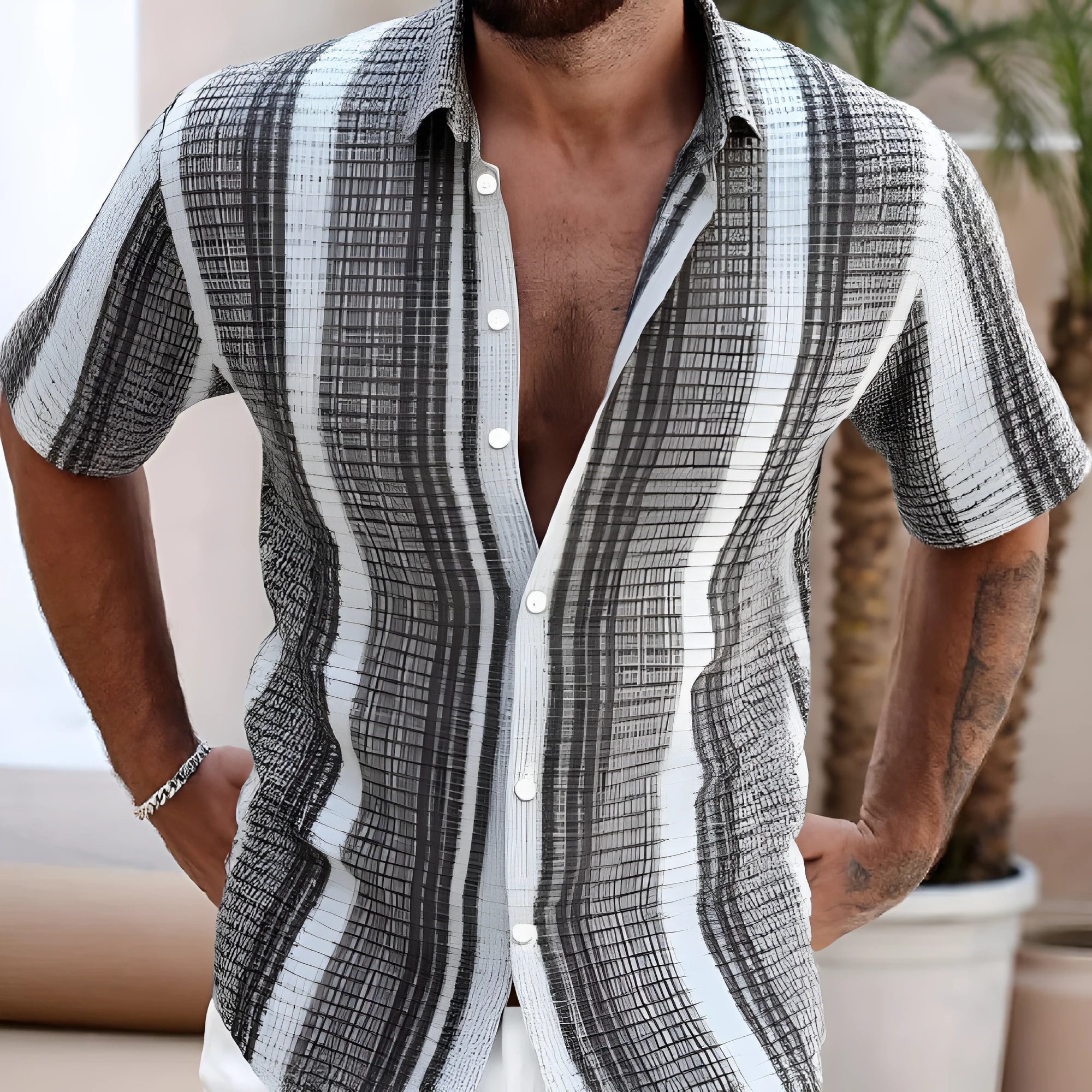 Man wearing a slim fit short sleeve casual shirt with a colourful floral 3D digital print.