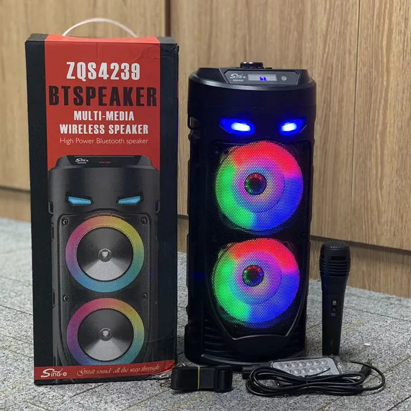 Black portable Bluetooth speaker with dual horn design and wheat-themed accents