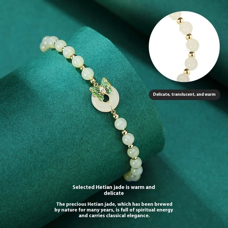 Cyan Hetian jade bracelet with sterling silver butterfly design and inlaid gemstones