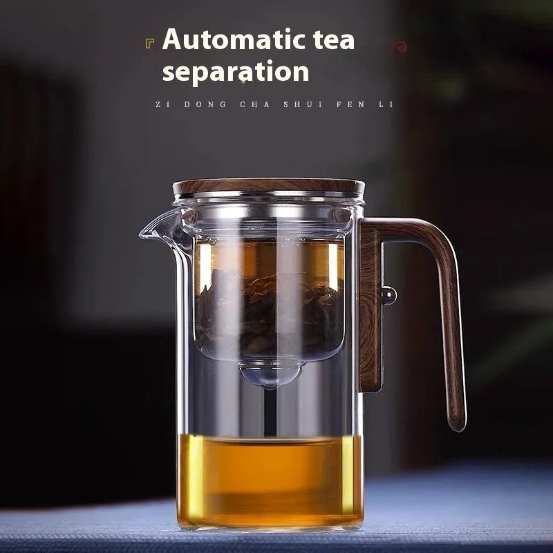 Glass teapot with wooden handle showing magnetic tea separation system and Chinese style design