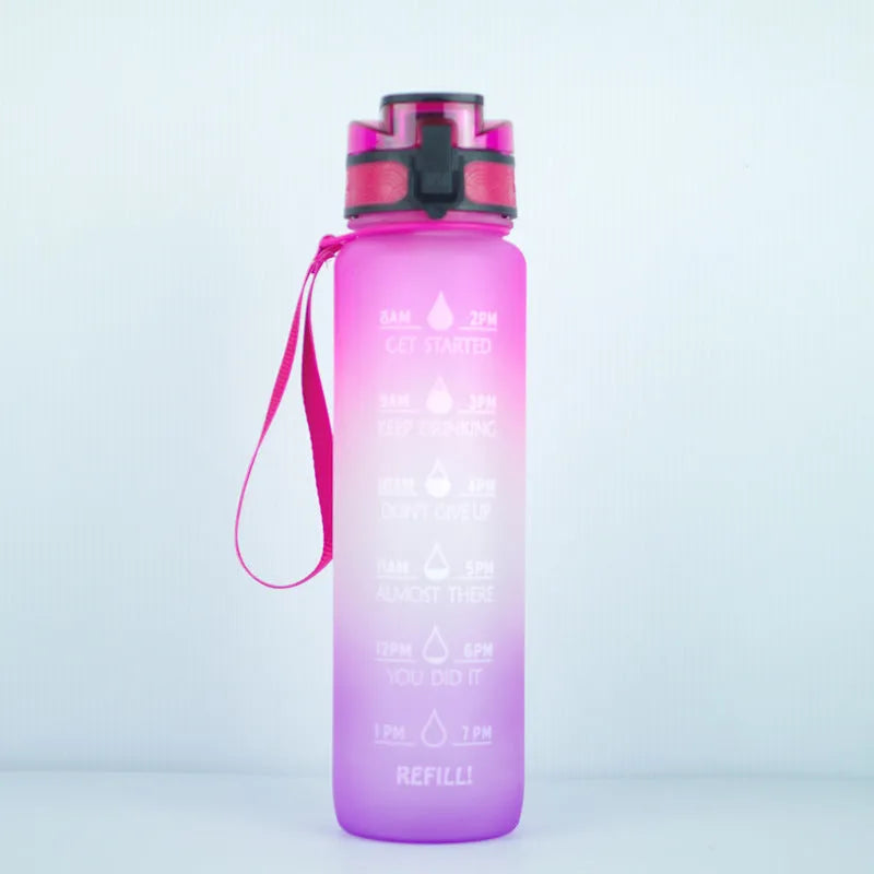 Clear 1000ml Tritan sports water bottle with blue lid and infuser inside, showing measurements.