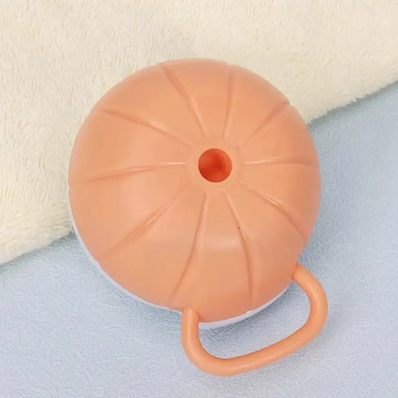 Orange TPR dog bath brush with shampoo dispenser and comb teeth for pet grooming