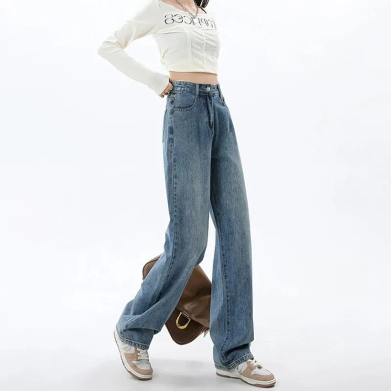 Women's retro blue wide-leg jeans with high waist and straight-leg cut on hanger