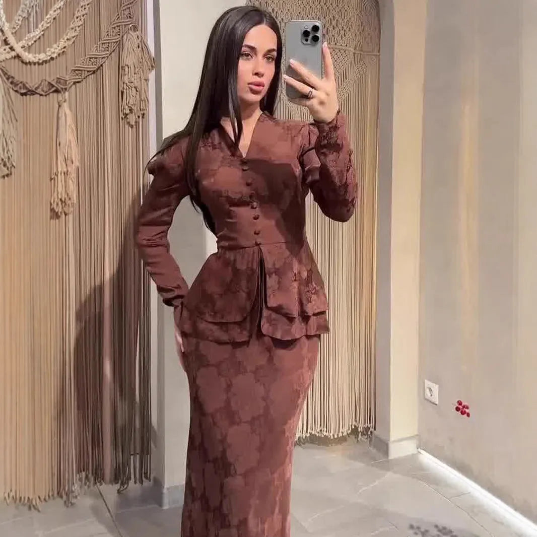 Dark brown retro dress with floral print, long sleeves, and fake two-piece design on mannequin